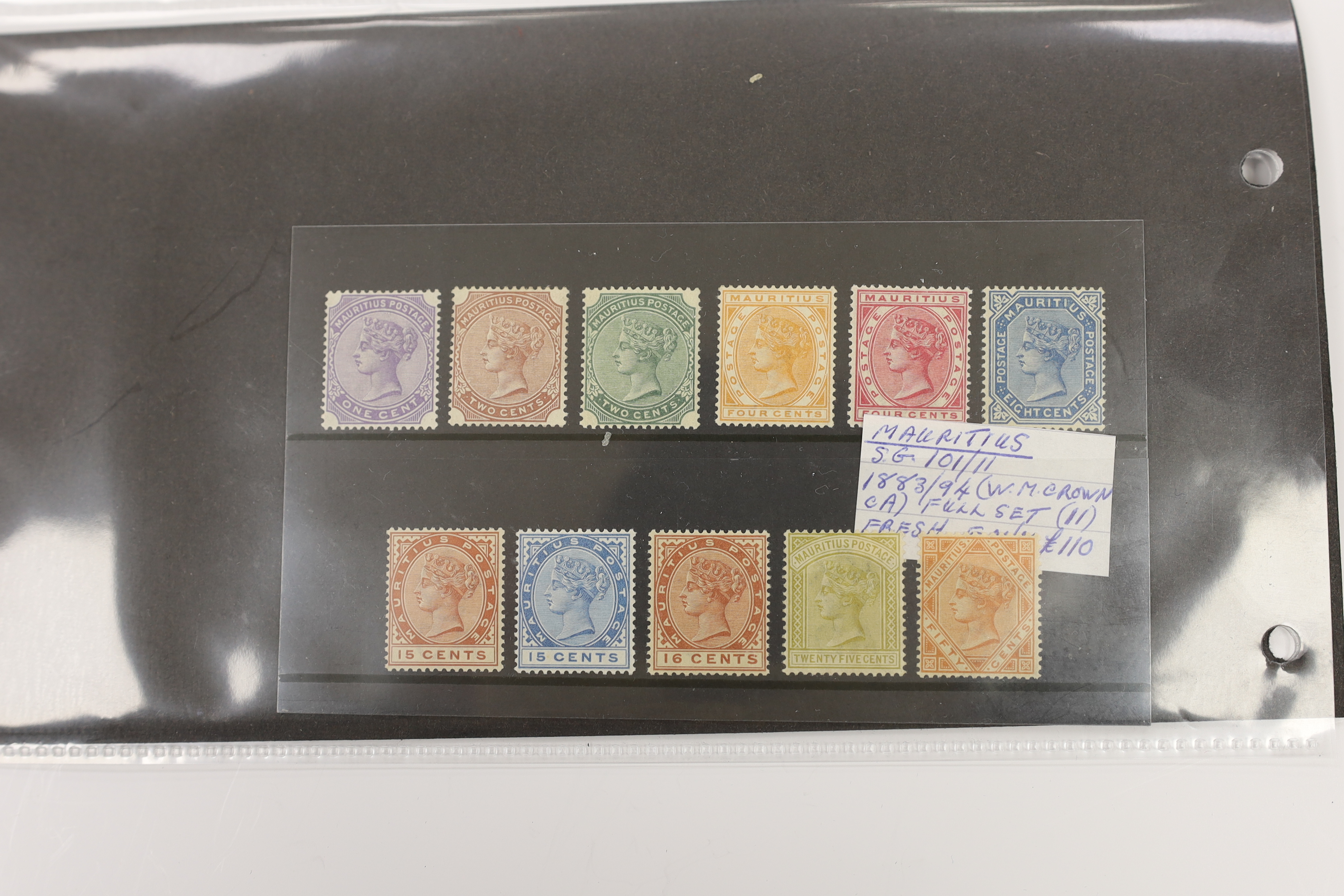 A selection of stamps including British East Africa, 1897 1r to 4r, Leeward Islands 1890 set, 1921 set to £1, K.U.T. 1912 1c to 10r, Tangyika 1927 to £1, Uganda 1898 set, Mauritius 1879-80 set, 1921 to 10r (2) etc.